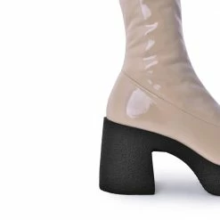 AKAADA Yoshi Beige Thigh-High Stretch Patent Boots